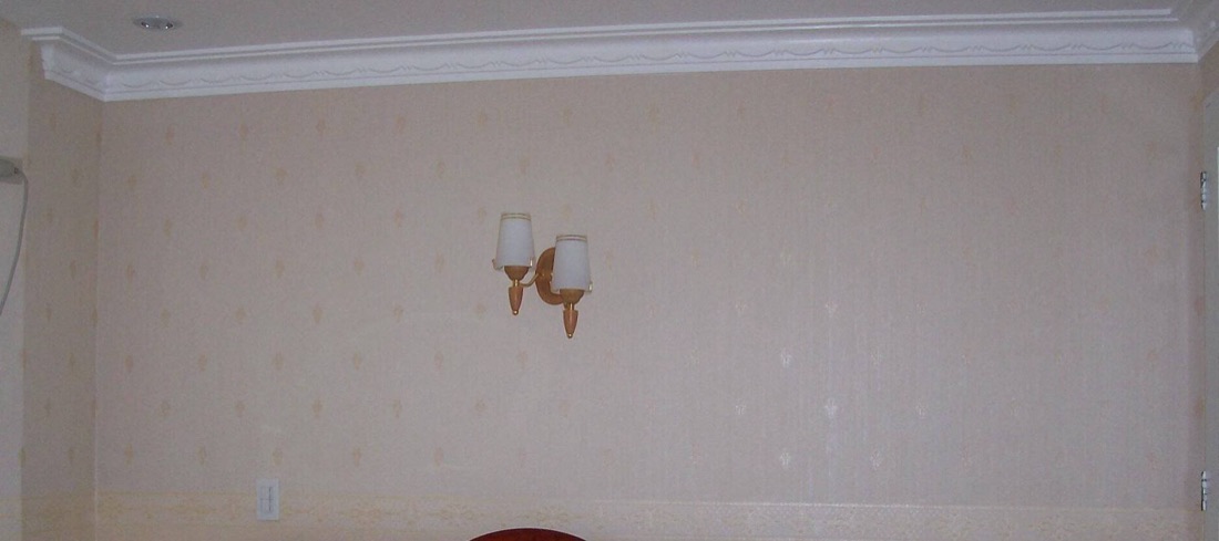 Imported wallpaper with decorative border installed in a Cebu City residence